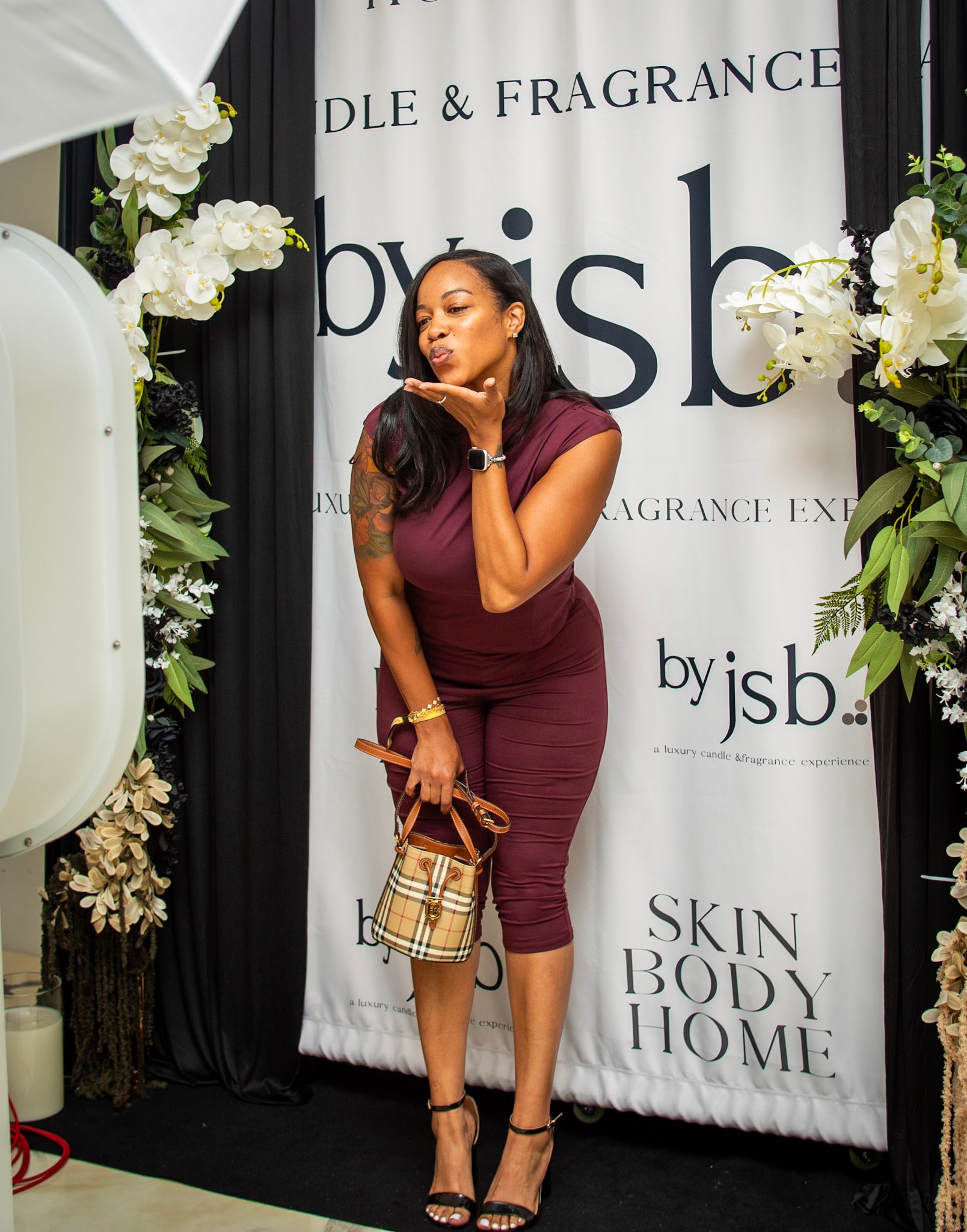 Bridal shower guests posing at a luxury photo booth